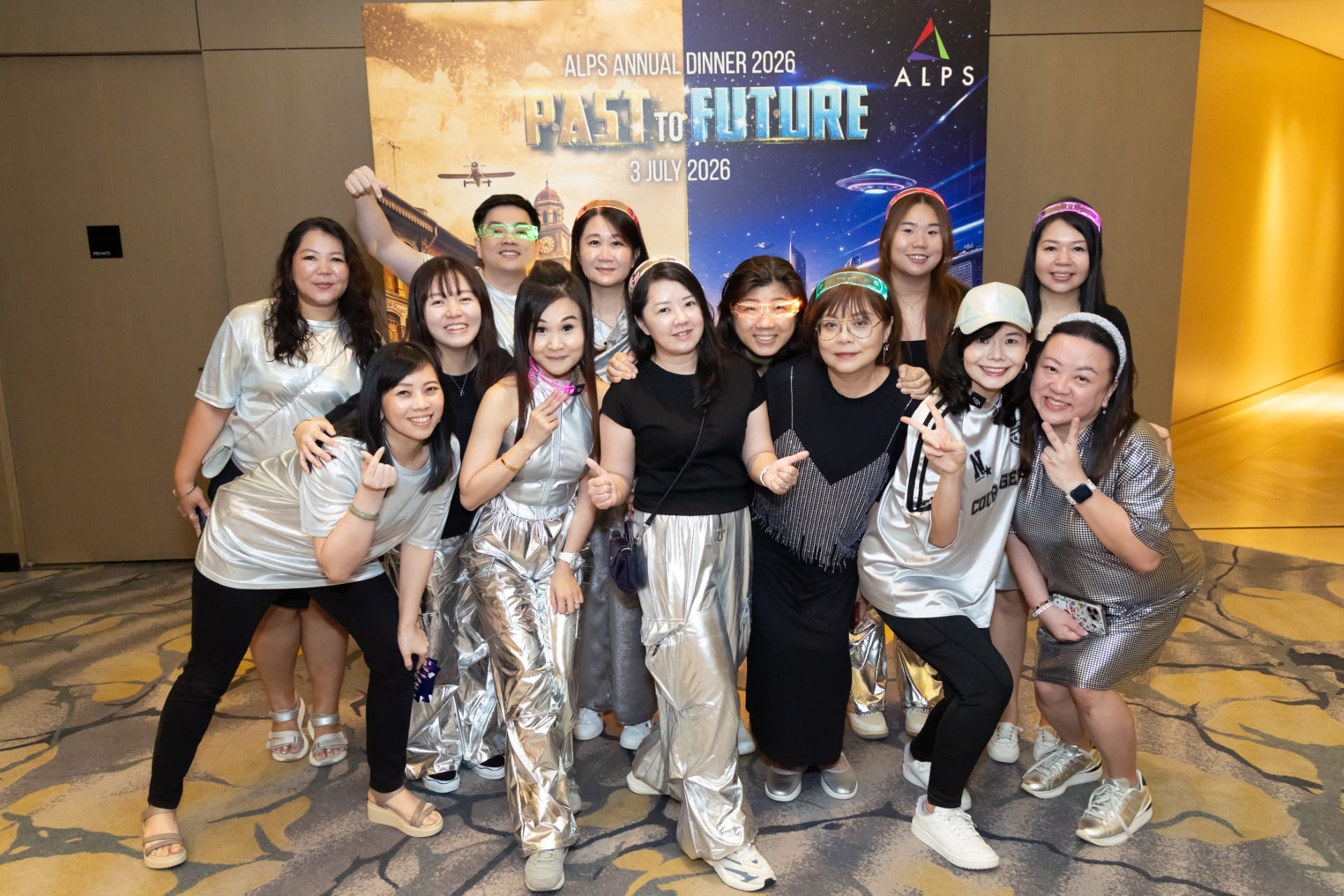 Photo of 13 ALPS staff taken at ALPS Anniversary Dinner